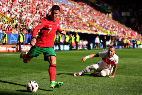 Cristiano Ronaldo dribbling and corssing the ball in the EURO 2024