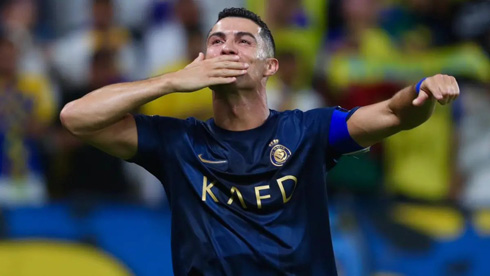 Cristiano Ronaldo blowing out kisses in Al Nassr