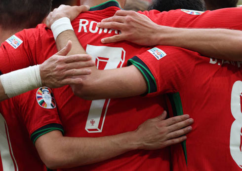 Cristiano Ronaldo in group hug with the Portuguese National Team