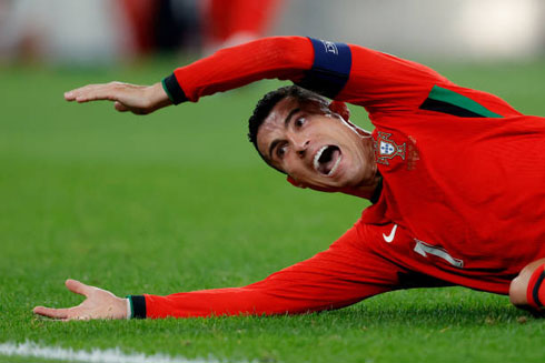 Cristiano Ronaldo goes down during Portugal match