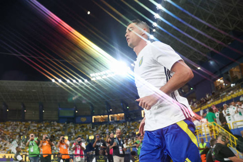 Cristiano Ronaldo entering the stadium wearing white shirt