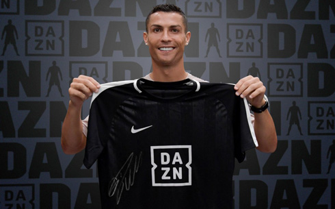 Cristiano Ronaldo holding a DAZN shirt endorsement