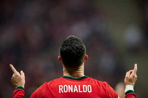 Cristiano Ronaldo back of the shirt and fingers pointing to the sky