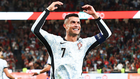 Cristiano Ronaldo playing for Portugal in white shirt