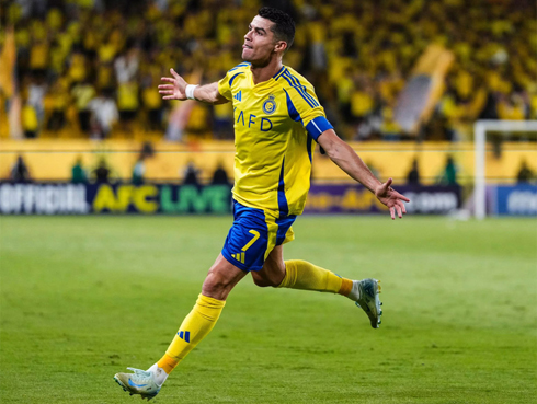 Cristiano Ronaldo scores for Al Nassr in yellow shirt