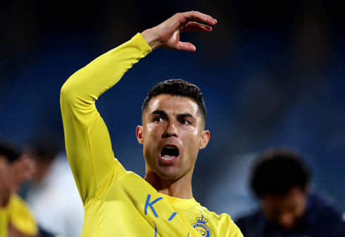 Cristiano Ronaldo gesturing to the fans after winning a game for Al Nassr