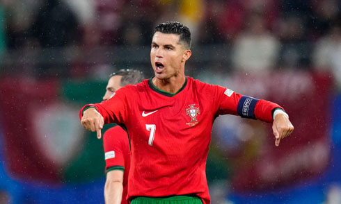 Cristiano Ronaldo pointing to the ground after scoring