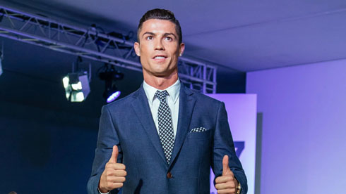 Cristiano Ronaldo wearing a suit in a product presentation