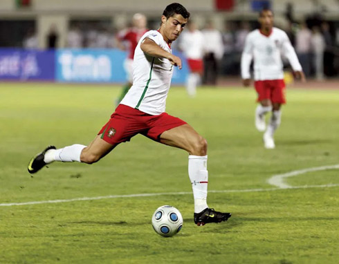 Cristiano Ronaldo playing for Portugal with a white shirt