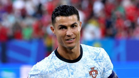 Cristiano Ronaldo in a Portugal blue and white shirt