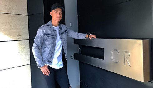 Cristiano Ronaldo opening the door of his new home